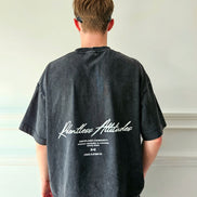 Muscular and relentless man wearing the Legacy Baggy T-Shirt
