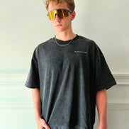 Muscular and relentless man wearing the Legacy Baggy T-Shirt