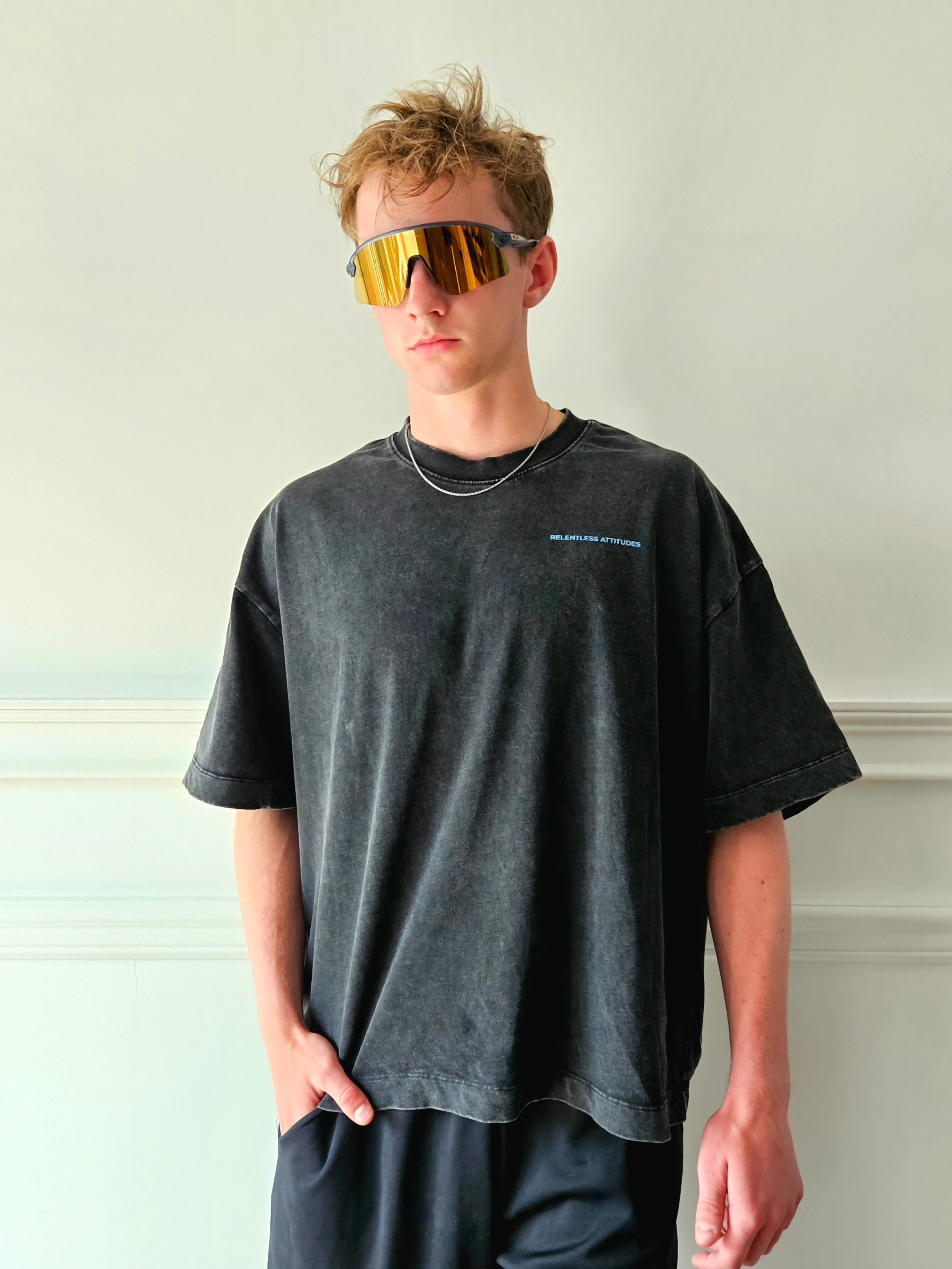 Muscular and relentless man wearing the Legacy Baggy T-Shirt